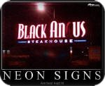 Partially illuminated neon sign.