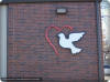 Routed aluminum heart and dove