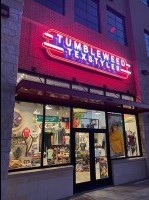 Beautiful storefront sign by Signs Manufacturing Corp. Beautiful storefront sign by Signs Manufacturing Corp.